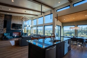 Large open main floor with a 16' high wall of windows overlooking The Great Smoky Mountains. 