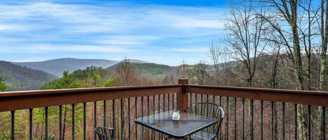Enjoy your morning coffee while gazing at the mountains and ample trees on your own private balcony outside of bedroom 3.  