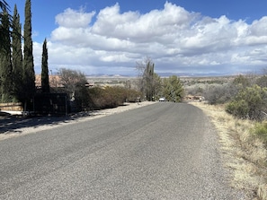 View from the house and road leads down the hill to the Verde River/trail