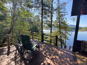 Front Deck. (Behind me is a gas grill you can use for an additional fee.)