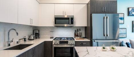 Kitchen with all new stainless steel appliances