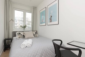 Comfortable double bed in the bedroom. 