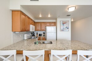 Kitchen with counter height bar stools