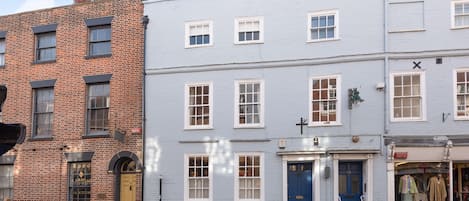 The Georgian House, Burgate sits opposite the Postern Gate