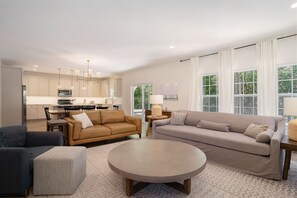 Sink Into the Serenity of Retreat on Preserve`s Living Room - Bathed in Natural Light from SoHa`s Summer Days