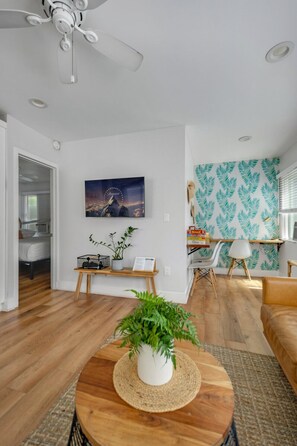 Open living space with lots of window to let in the ocean breeze!