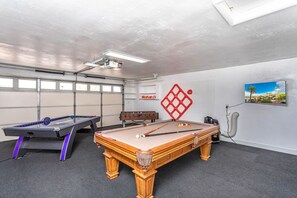 A gamer's paradise! Enjoy a variety of games to keep everyone entertained.