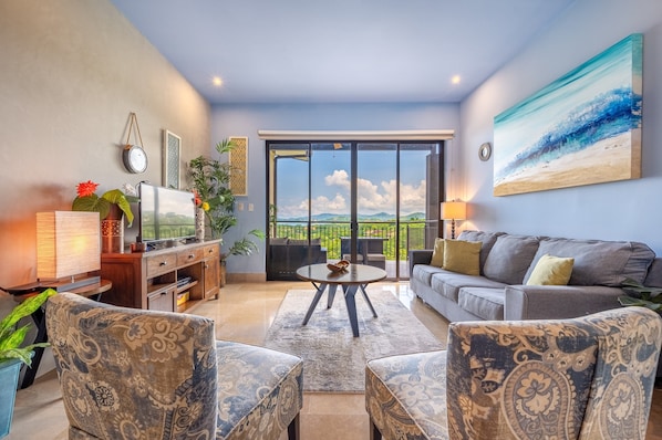 Spacious living area with direct access to the terrace, offering stunning ocean views