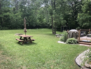 Grill out and dine on the backyard picnic table!