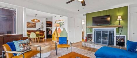 Living room area with wood burning fireplace