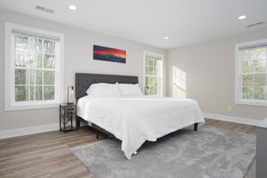 Primary bedroom suite with full bathroom