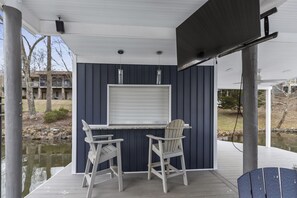 You will LOVE the covered dock, where you can watch games and have your own private bar!