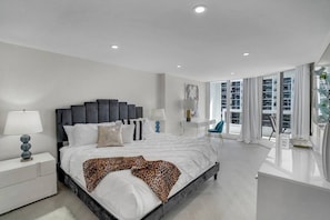 Master bedroom suite, king bed, Roku tv, balcony access, desk, private bathroom