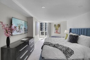 2nd largest bedroom, king bed, Roku streaming tv, balcony access