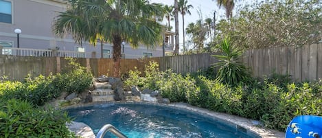 Casa Gardenia Lush Backyard with pool patio and grill