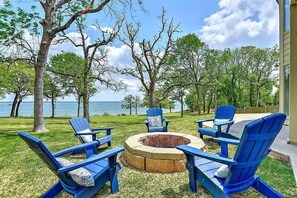 Enjoy views of the lake during the day or an evening around the firepit
