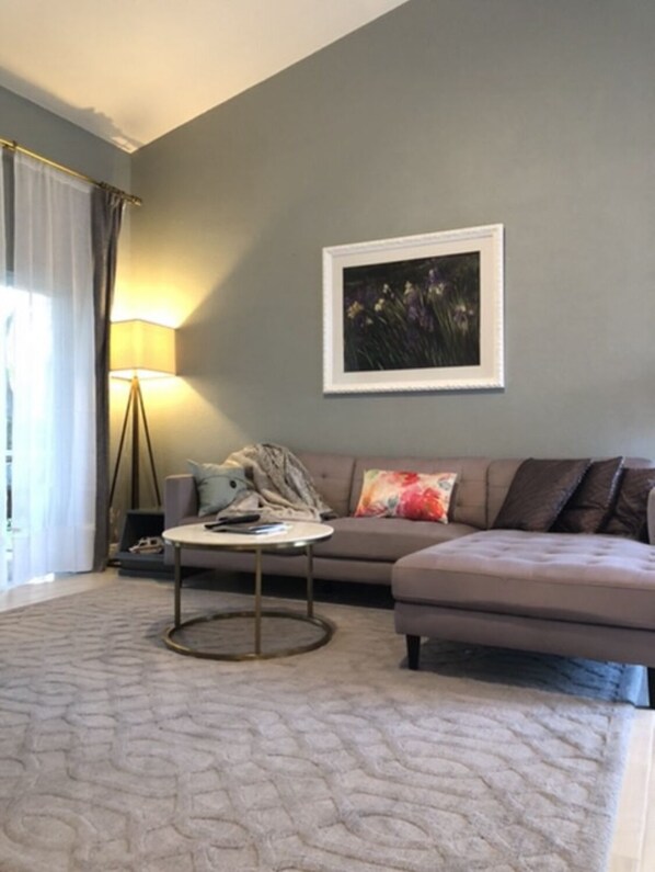 Living area with vaulted ceiling 