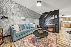 A queen sleeper sofa and all bedding available if needed for the kiddos etc 