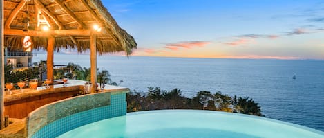 Sunset view from the pool and palapa bar