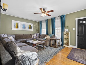 Living room with large deep cozy couch