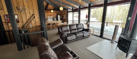 Great Room.  Note gas fireplace and floor to ceiling windows.