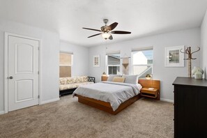 Second bedroom upstairs has Queen bed with floating nightstands, and an ensuite bathroom. Tastefully decorated for your comfort.
