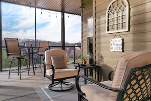 Relaxing screened-in patio.