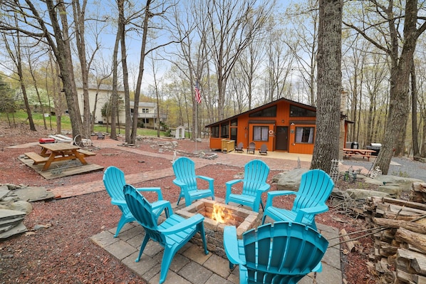 Large area for outside entertainment, grill, smoker, outdoor fire pit and plenty of outside seating!