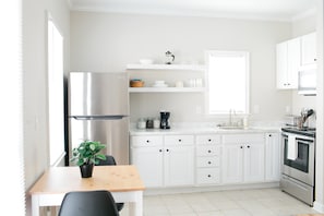 Cook up a storm in our stunning stainless kitchen.