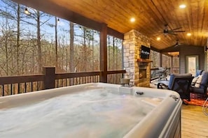 Experience hot tub bliss with a picturesque view, right on your doorstep, perfect for evening relaxation.