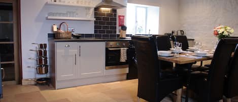 Large stylish kitchen with dining area