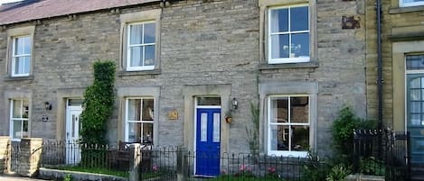 Ivy Cottage over looking the village green in West Burton, Wensleydale in the Yorkshire Dales