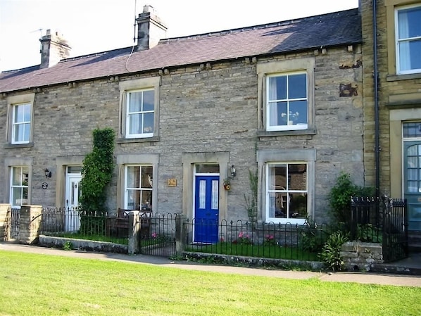 Ivy Cottage over looking the village green in West Burton, Wensleydale in the Yorkshire Dales