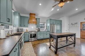 Spacious fully stocked kitchen with gas range!