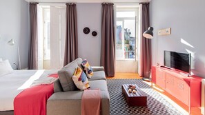 Living area with sofa and TV (no cable channels, streaming only) for laidback moments #relax #airbnb
