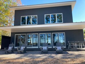 View of the water-side of the cottage, and it's many windows