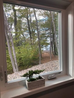 Large window at entry for allowing natural light into the stairwell