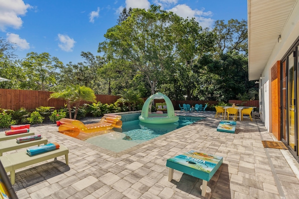 Endless outdoor activities: soak up the sun while the salt waterfall tranquilizes you. Play life size beer pong, corn hole, ping pong, sit by the smokeless firepit, play cards at the outdoor table, or watch a movie on our 20-ft outdoor theater. 