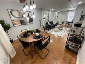 A spacious dining room that seats 4 people.