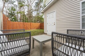 Relax on the patio and enjoy the private fenced in yard, perfect for dogs!
