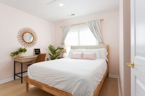Guest room: queen memory foam bed, blackout curtains, desk space