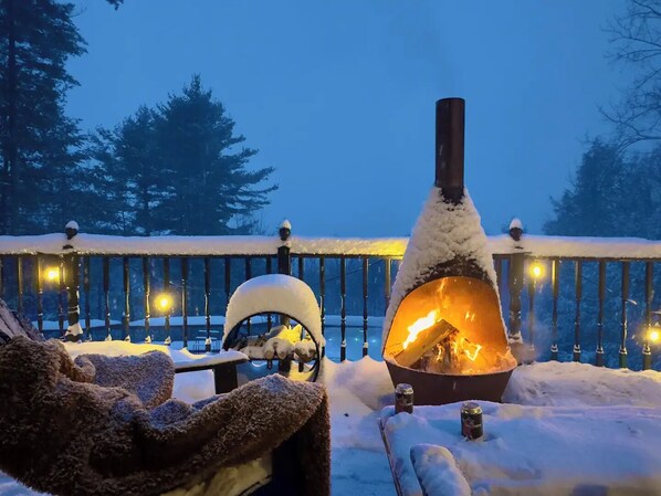 Patio fireplace looking over Catskill mountains and the hot tub