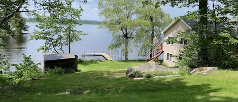 Lakefront property with private yard & dock.