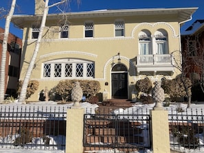 Front of the house viewed from Race Street (note pineapples on front gate!)