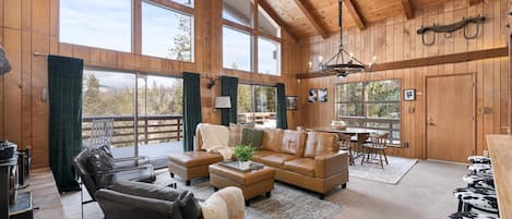 Living room with floor to ceiling windows for ultimate views