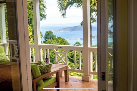 Enjoy the view...morning coffee or lazy afternoons on the covered porch!