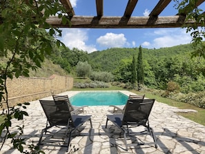 Same pool from the other end looking out from the pool pergola