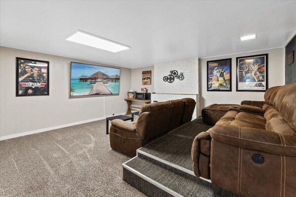 Your group will love watching movies and sports in the Theater Room!