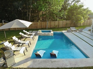 Indulge in our heated pool and spa, your private oasis for relaxation and rejuvenation.