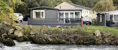 Cabin viewed from opposite side of the river